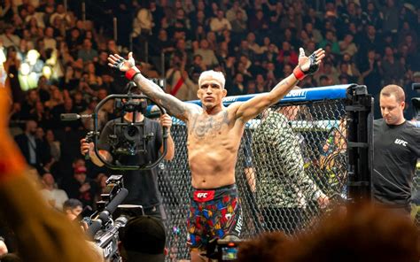 charles oliveira|Charles Oliveira earns TKO win over Michael Chandler to claim UFC.